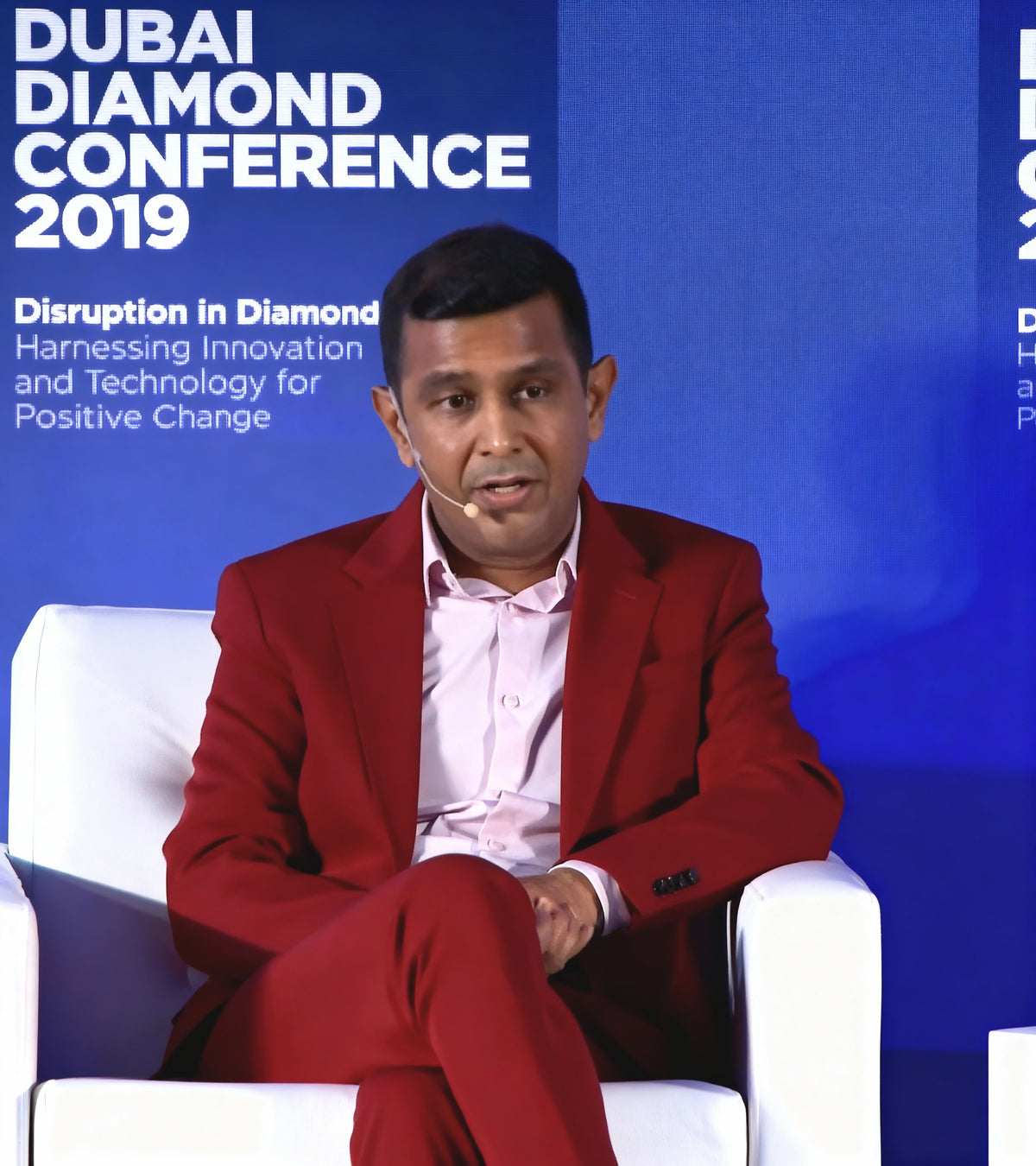 An image of the 2019 DMCC Dubai Diamond Conference panel featuring Amish Shah of ALTR in debate with De Beers. The visual captures a pivotal industry moment where ALTR led the discourse on how lab-grown diamonds are disrupting and coexisting within the global diamond market.