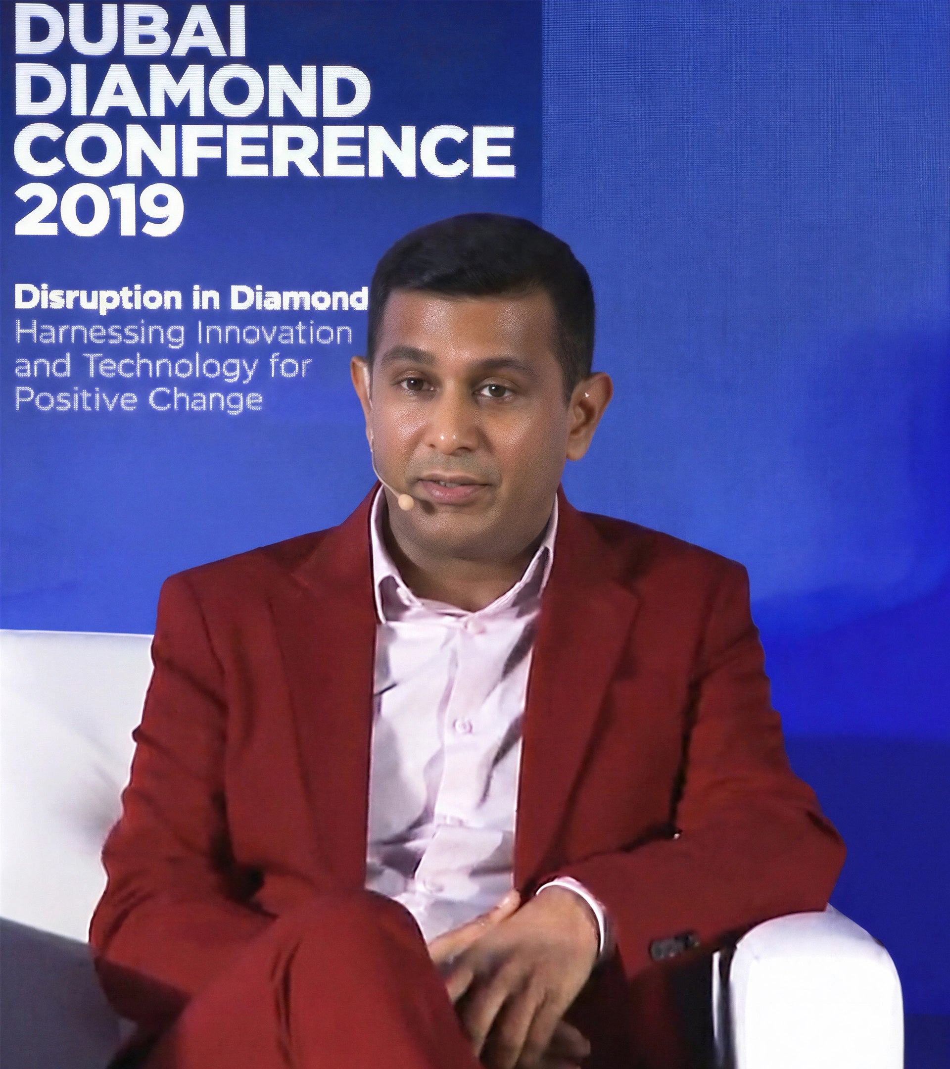 An image of the 2019 DMCC Dubai Diamond Conference panel featuring Amish Shah of ALTR in debate with De Beers. The visual captures a pivotal industry moment where ALTR led the discourse on how lab-grown diamonds are disrupting and coexisting within the global diamond market.