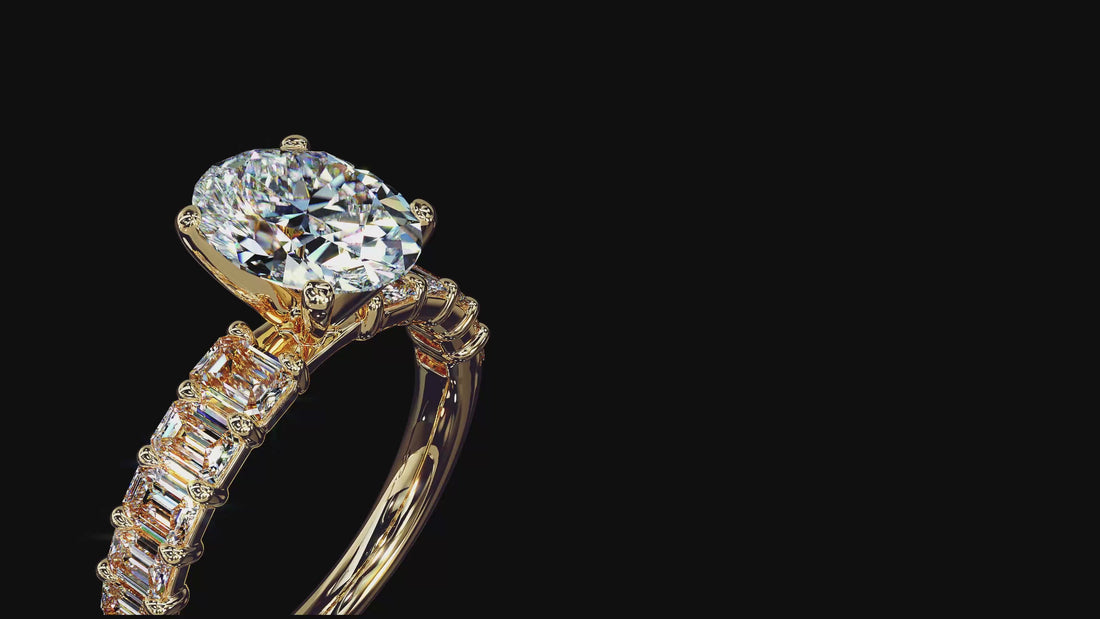 Close-up video of an ALTR Created Diamonds oval brilliant-cut diamond solitaire ring. The film showcases the elongated symmetry of the lab-grown oval diamond and its brilliant-cut faceting that maximizes light performance. Set in a specialized 18K yellow gold crown mounting, the camera pans to highlight the polished gold shank and intricate prongs, emphasizing the contrast between the rich gold and the colorless Type IIa diamond.